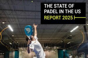 Padel player serving indoors at Conquer Padel club promoting the State of Padel in the U.S. Report 2025
